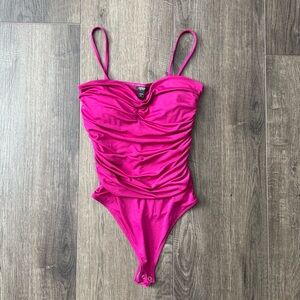 Express Body Contour Bodysuit size XS. Very flattering!